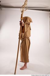 JOEL_ADAMSON STANDING POSE WITH A MAGIC STICK